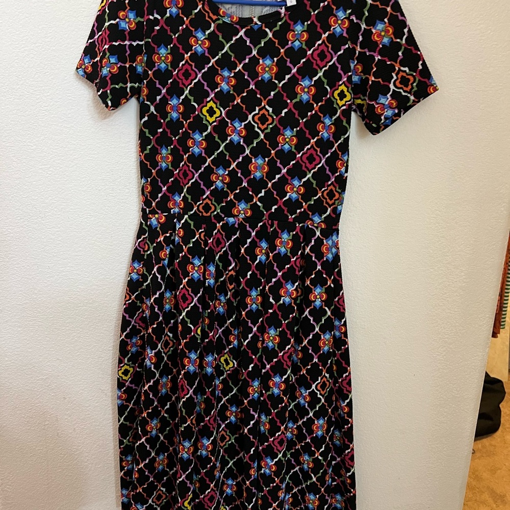 Beautiful LuLaRoe Amelia with a black background and bright colors